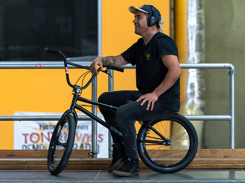 Riding a bike while wearing Jlab Headphones