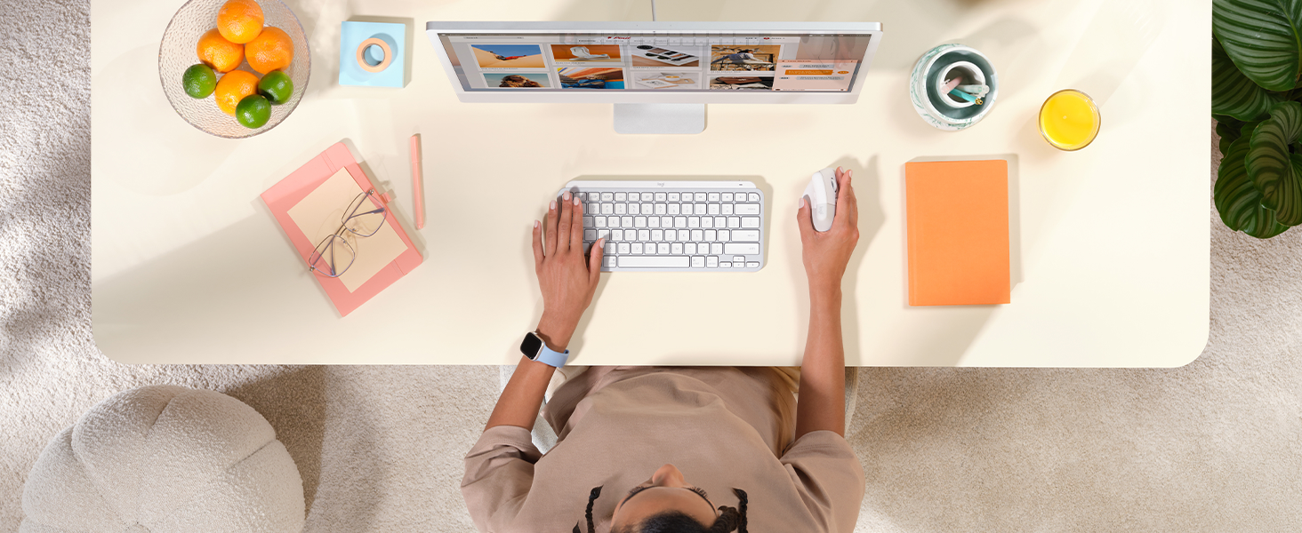A woman working on a computer using Lift for Mac