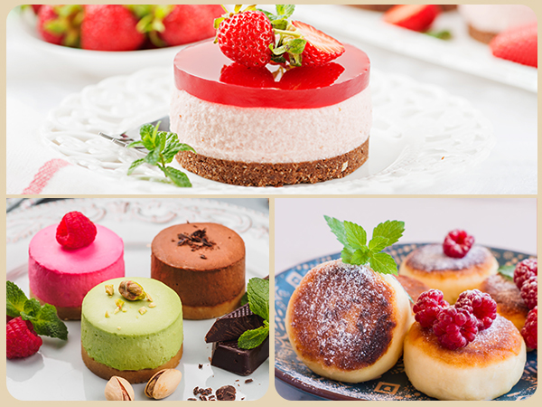 Assorted mini desserts. Includes strawberry-topped cheesecake, chocolate mousse, pistachio cake, and fruit-topped pastries. Garnished with fresh berries and mint leaves.