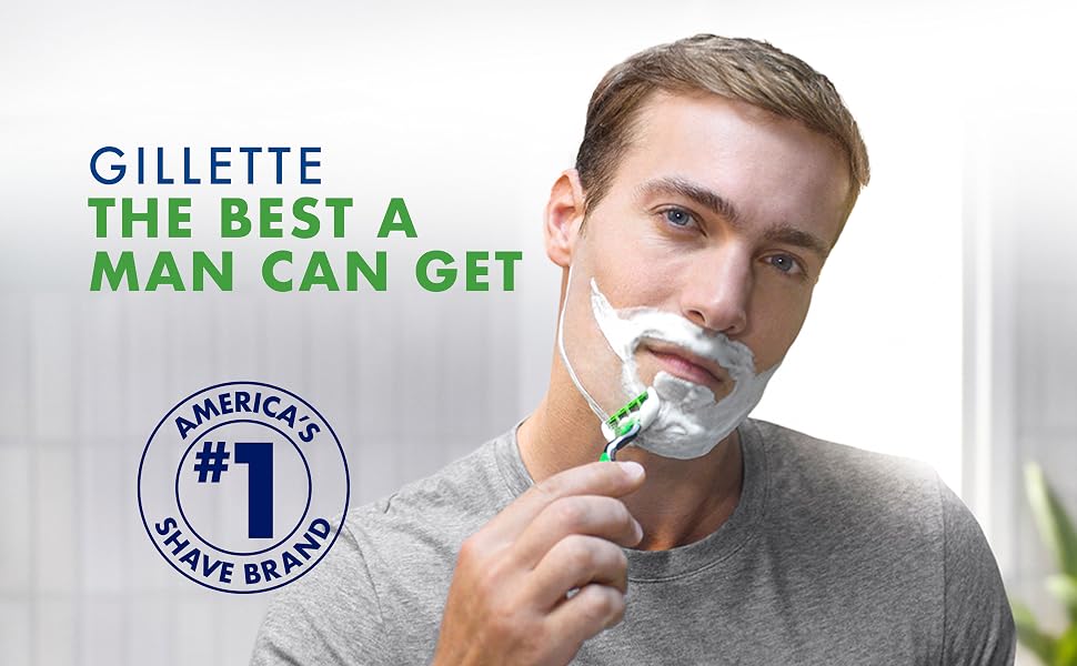 Man looking at the audience shaving his chin