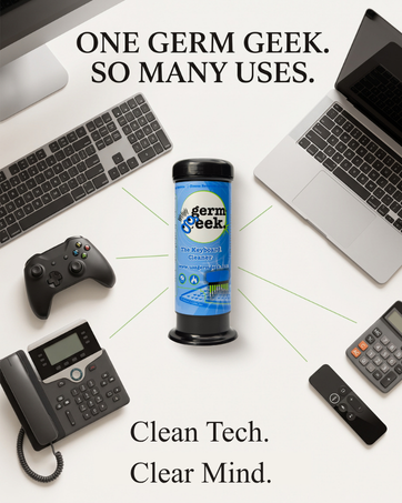 Germ Geek cleaner surrounded by keyboards and electronics, highlighting versatile tech cleaning.