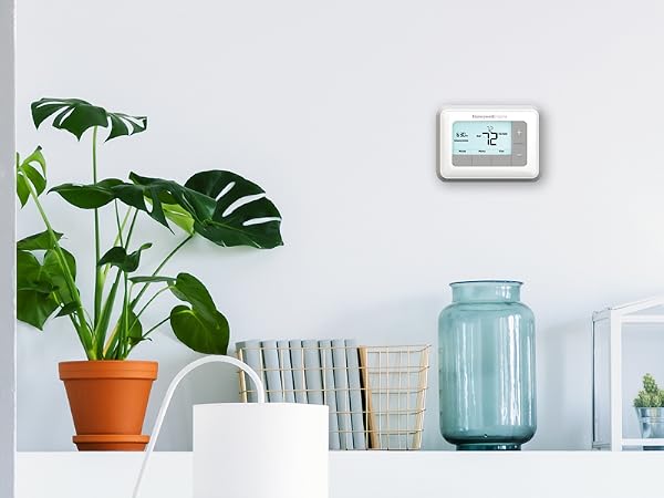 RTH7560E Thermostat on wall able shelf
