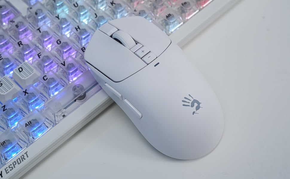 Bloody R72 Ultra White wireless gaming mouse on desk with RGB keyboard