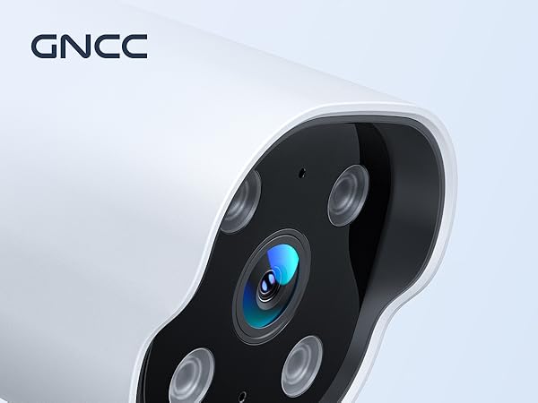 Close-up view of a GNCC security camera lens array featuring one blue-tinted central lens surrounded by four smaller auxiliary lenses in a white housing.