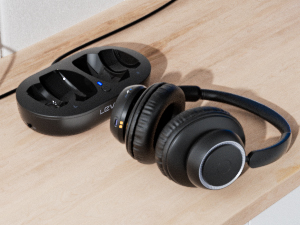 Turn on the headset and wait for it to pair with the transmitter automatically