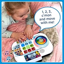 Kid laughs while toy mixer says: 1, 2, 3, c’mon and move with me!