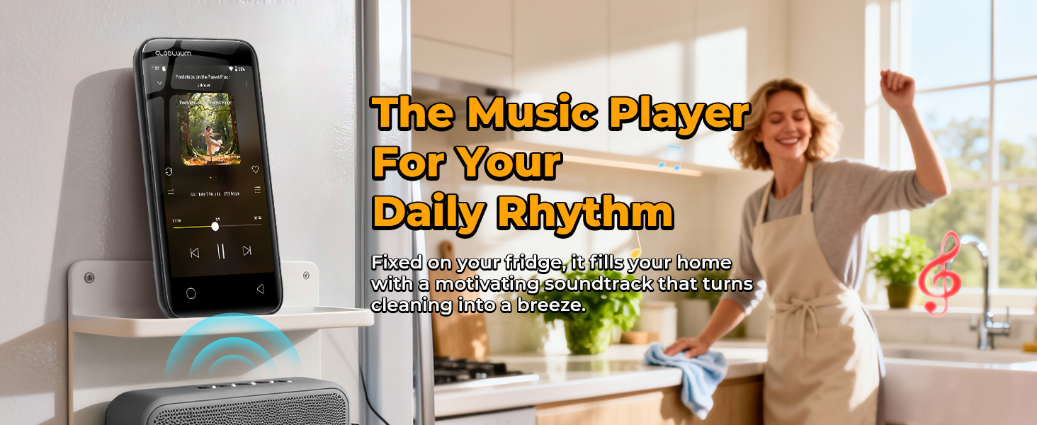 MP3 player on the fridge playing music, paired with a speaker while a person cleans in the kitchen