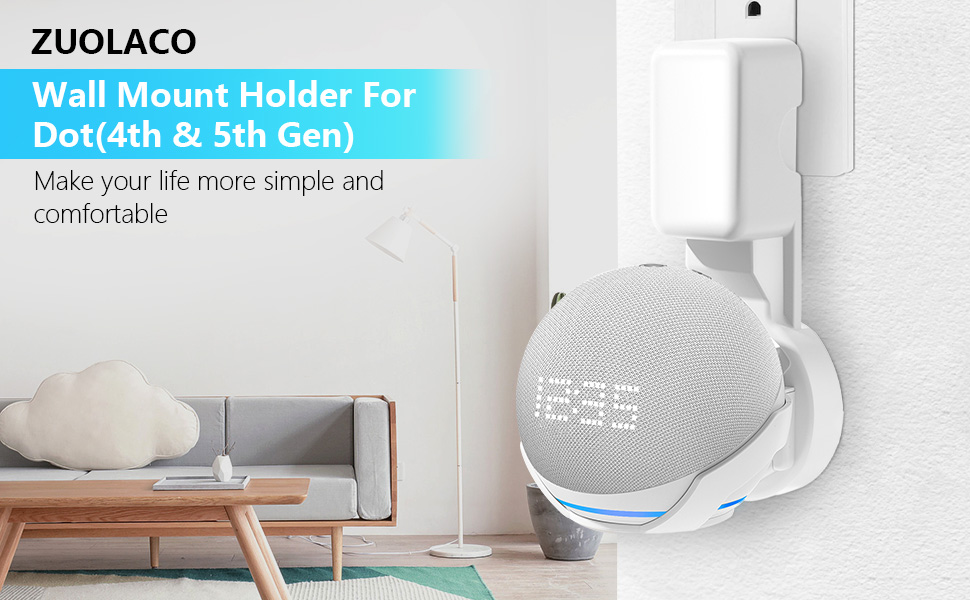 a speaker that is on a wall next to a couch.