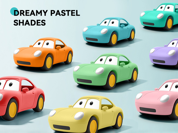 Seven cartoon toy cars in pastel colors: orange, red, yellow, green, blue, purple, and pink. Cars have large eyes and yellow wheels. Text reads 'Dreamy Pastel Shades'.