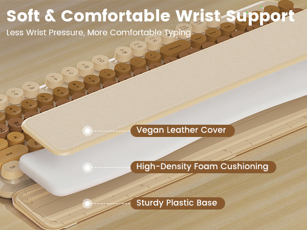 wireless keyboard with magnetic snap on wrist rest shown attaching and removing in seconds