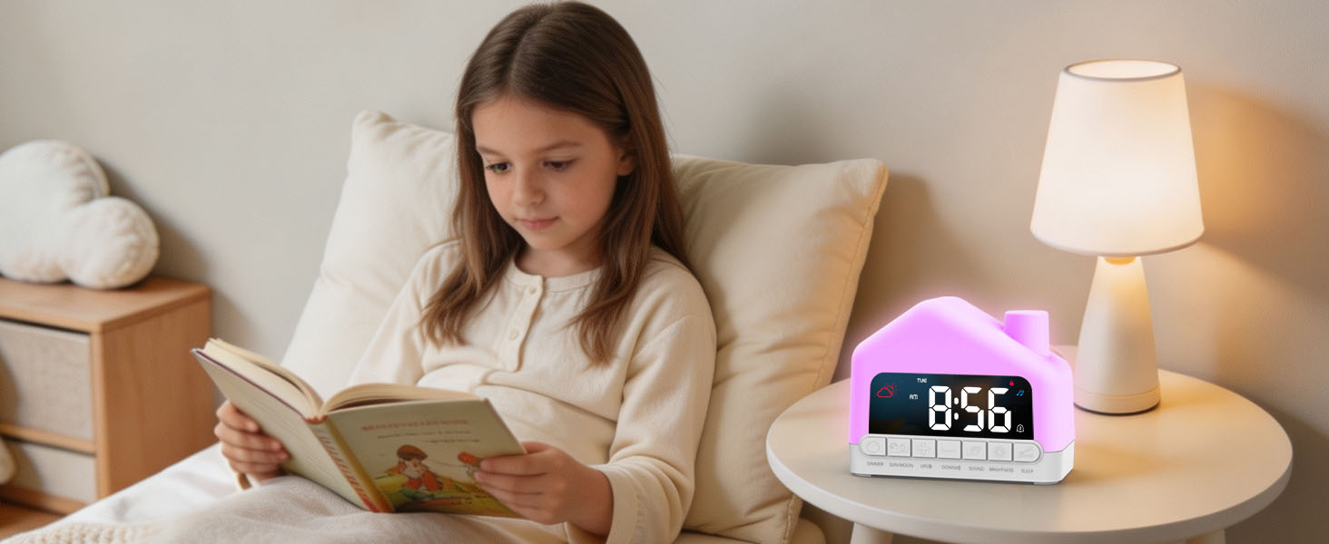 Woman reading book in bed next to bedside table with digital alarm clock displaying time and pink desk lamp with fabric shade providing warm illumination.