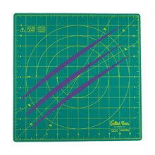 the green and purple cutting board