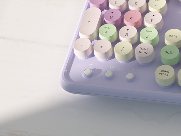 purple colorful wireless keyboard and mouse