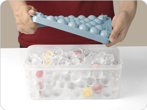Finally, twist the ice cube tray to get ice balls