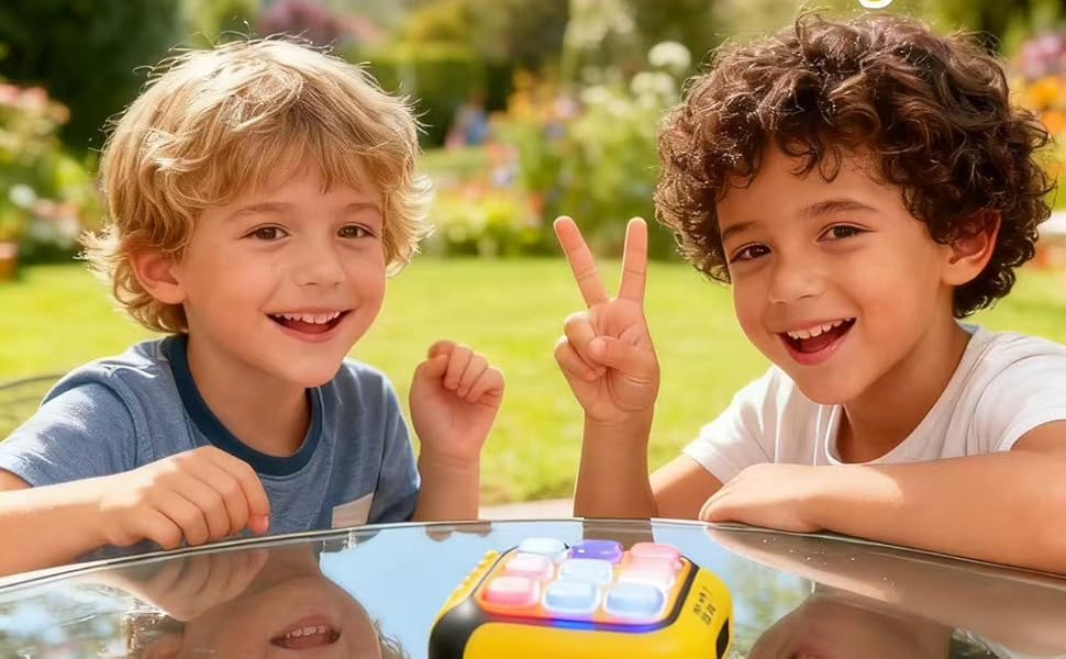 Two young children playing and learning together with joyful expressions.