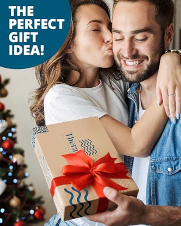 couple looking at Theraflow christmas gift