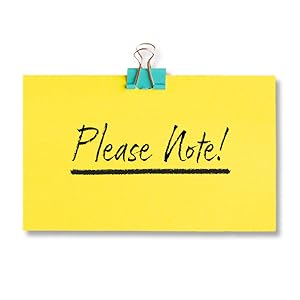 Yellow sticky note with 'Please Note!' handwritten in black, attached to a surface with a silver binder clip against a white background.
