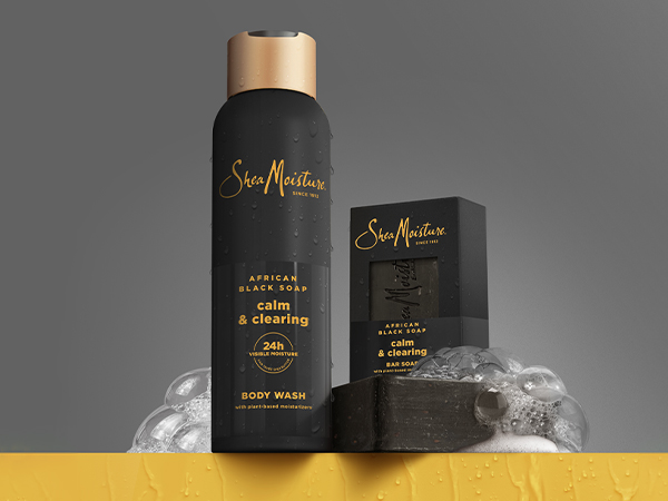 A collection shot of the African Black Soap Body Wash and Bar Soap on a dark gray background.