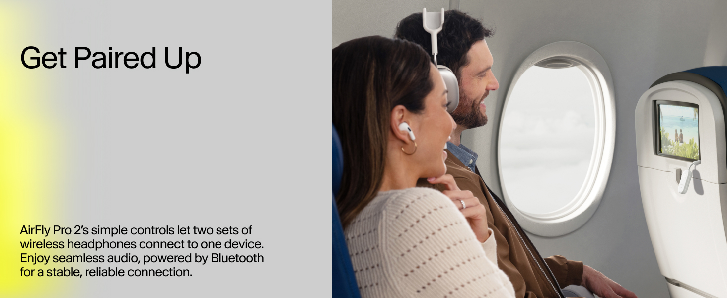 Couple on airplane using wireless earbuds with AirFly Pro 2, sharing audio from via Bluetooth