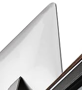 Close-up diagonal view of a sleek metallic surface with sharp angular edges, showing brushed steel finish.