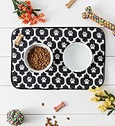 Black lattice food mat with small pet bowls on it