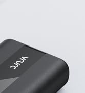 Close-up of a black electronic device corner, showing textured surface and 'Vinu' branding in white text.