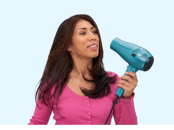 Woman with hair dryer