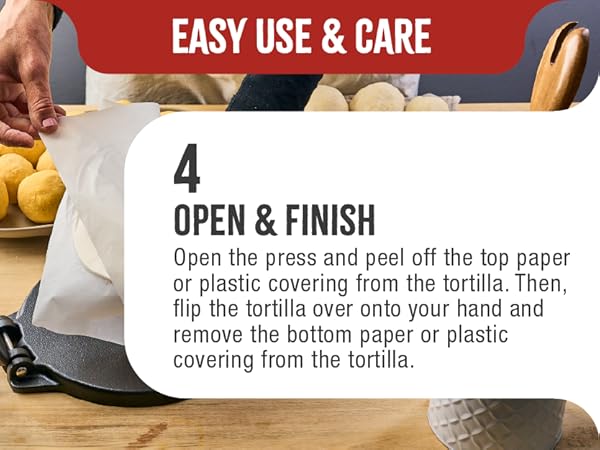 A corn tortilla sitting on a plastic-covered tortilla maker