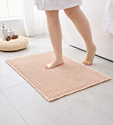 beige bath rug