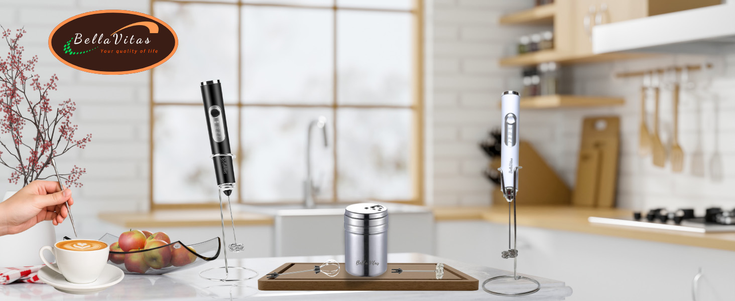 Black and white milk frothers, stainless steel shaker, latte art pen, displayed in a kitchen