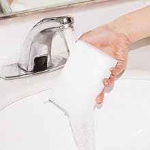 Rinse the sponge with water