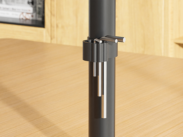Black metal pole mount accessory with adjustable clamp mechanism and vertical chime or rod holders attached.