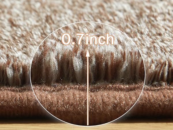 brown low pile rug
