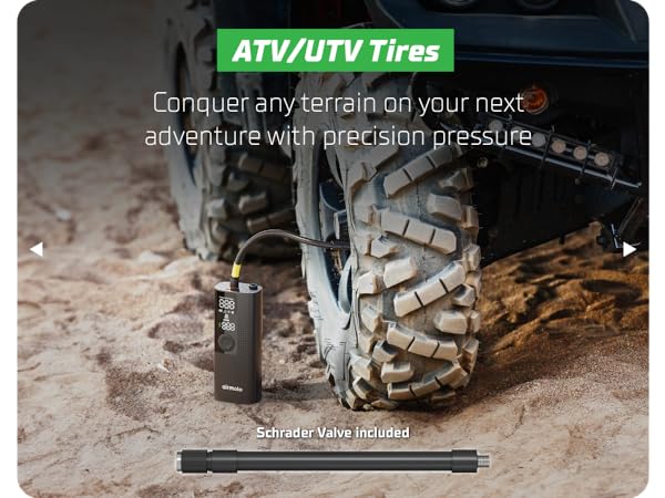 Motorcycle tire inflator connected to rear tire, showing quick inflation capability