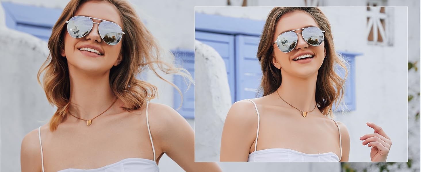 A stylish and elegant lady wearing silver mirror glasses at the castle
