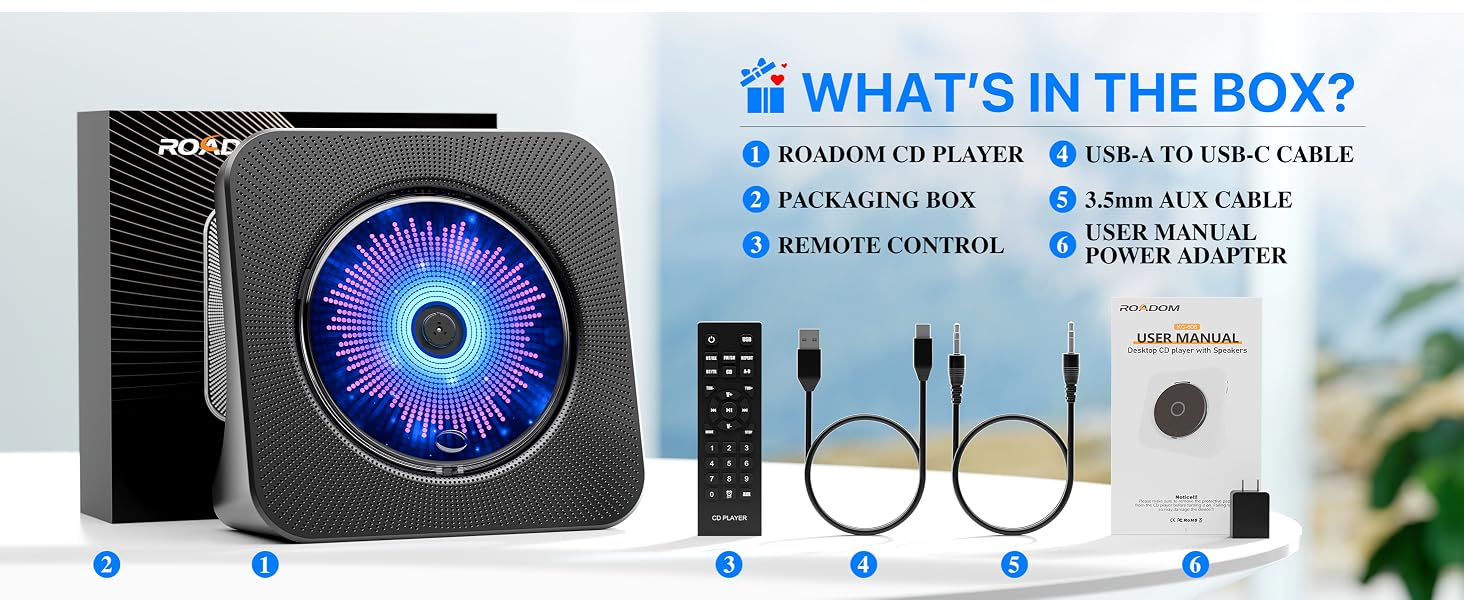 ROADOM portable CD player package with remote, AUX cable, USB cable, power adapter and manual