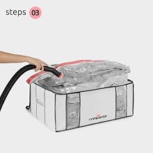 Vacuuming the comforter storage bag
