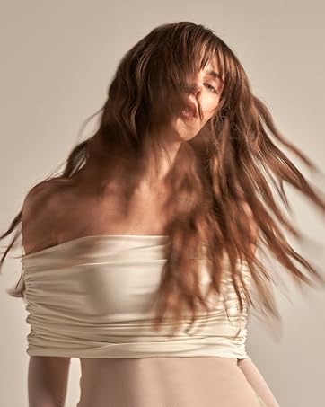 Model swinging long hair
