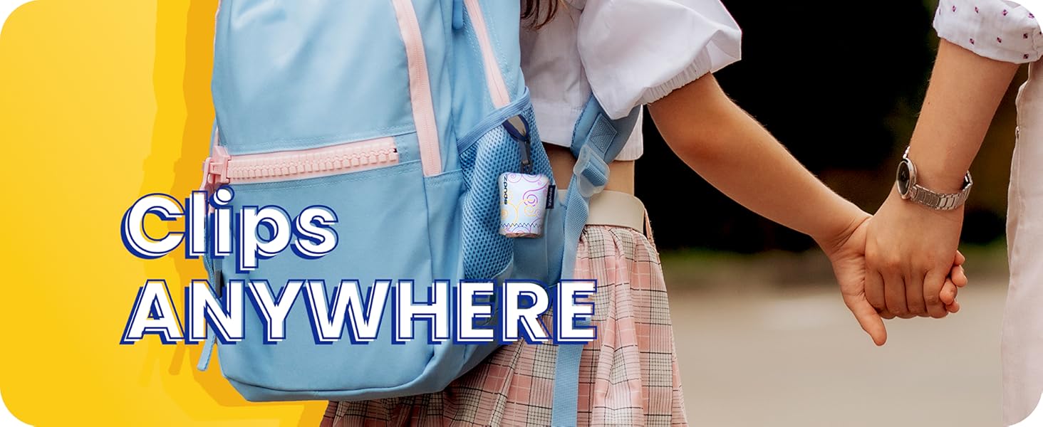 Girl with a spudz clipped to her backpack while holding moms hand to walk to school.