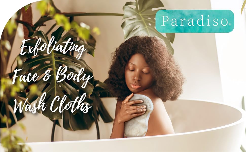 A Black woman with natural hair bathes in a bathtub