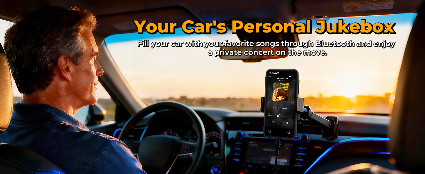 Man driving at sunset with a Globluum MP3 player mounted in the car streaming music via Bluetooth.