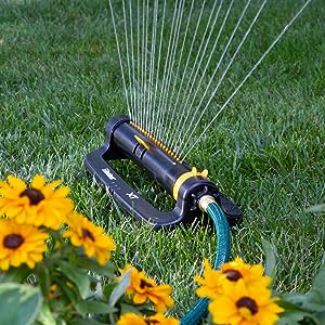 Melnor Oscillating Sprinkler watering a lawn