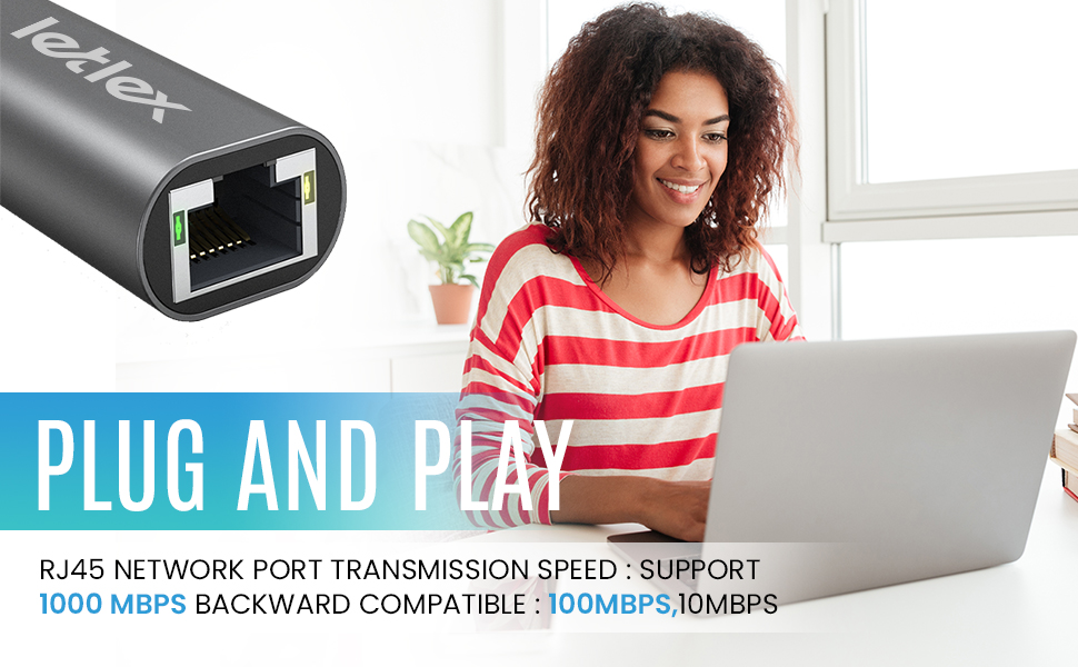 Women using laptop ethernet adapter usb c internet connection device 