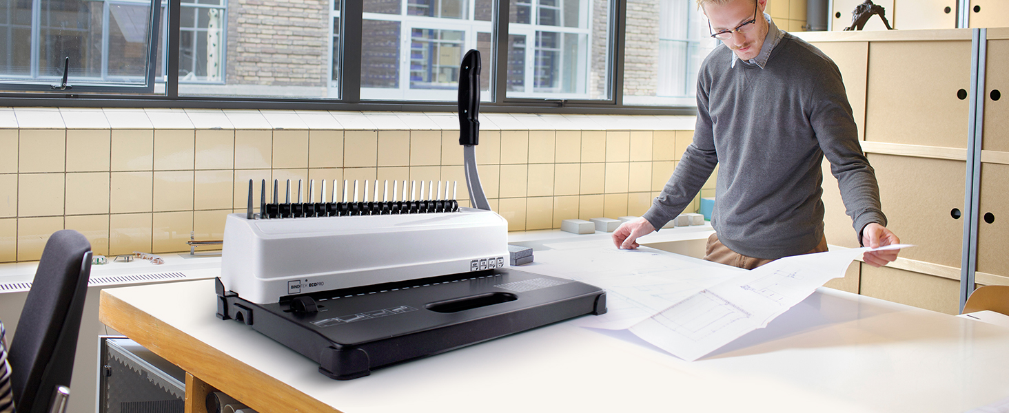Comb binding machine
