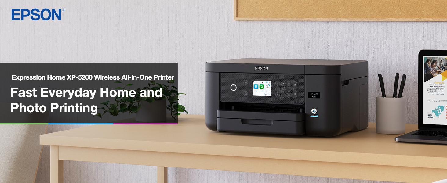 Black Expression Home XP-5200 printer sitting on desk.