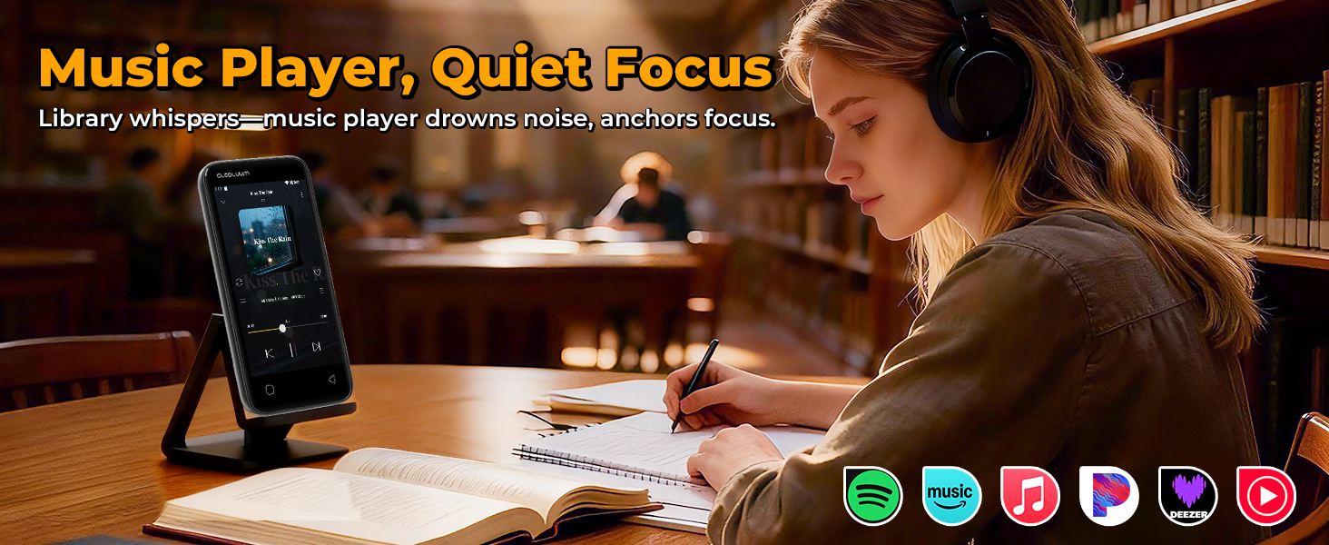 Student wearing headphones studies in a quiet library with a Globluum MP3 player on a stand.