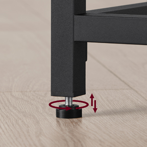 a close up of the foot of a table with a screwdriver.