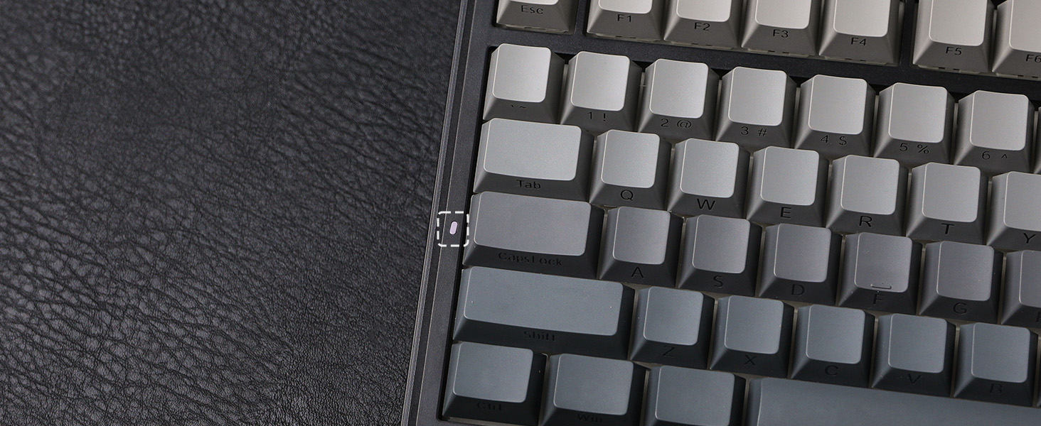 a close up of a keyboard with a broken key board