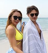 People wrapped in Turkish beach towels