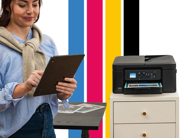 Woman sending documents to Brother MFCJ1360DW inkjet wireless printer from mobile tablet